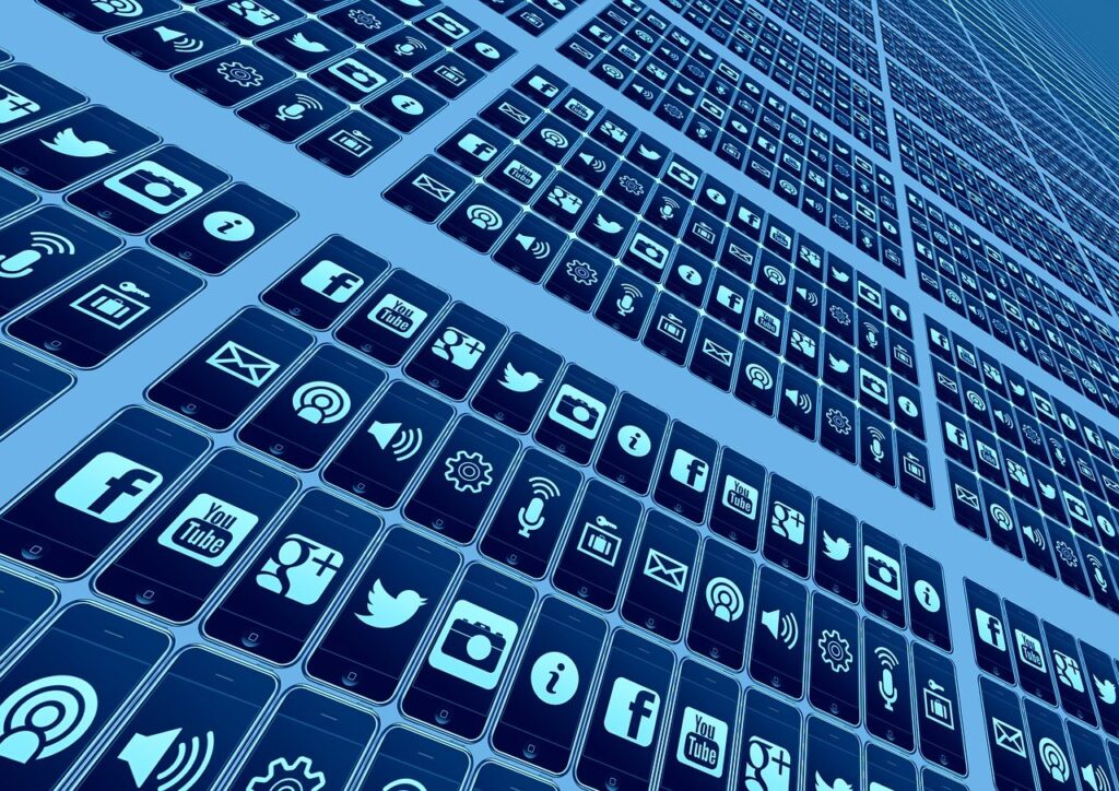 A bunch of phone screens showing different social media logos.